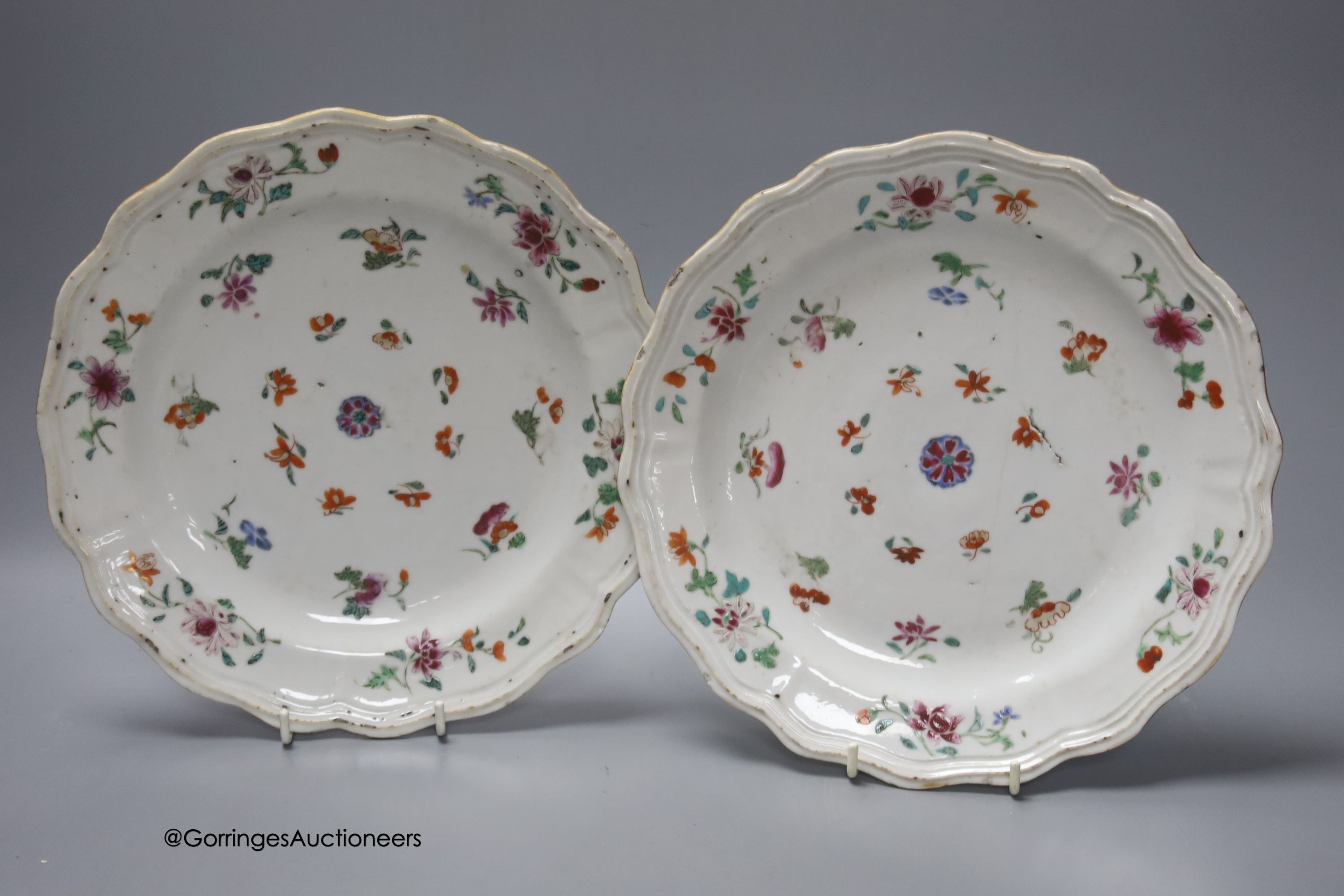 A Chinese late 19th century blue and white vase, height 25.5cm, a pair of 18th century Chinese export famille rose plates and a blue and white tea bowl